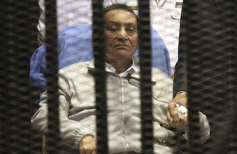 Egypt's ousted President Mubarak sits inside a dock at the police academy on the outskirts of Cairo Egypt's ousted President Mubarak sits inside a dock at the police academy on the outskirts of Cairo